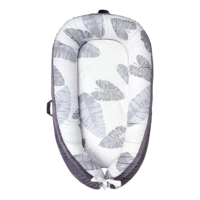 HushPod Luxe Baby Cot: Soft Mattress, Removable Bed & Stylish Ribbon Detail