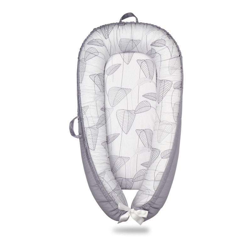 HushPod Luxe Baby Cot: Soft Mattress, Removable Bed & Stylish Ribbon Detail