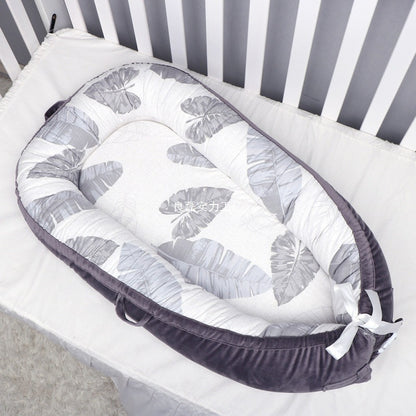 HushPod Luxe Baby Cot: Soft Mattress, Removable Bed & Stylish Ribbon Detail