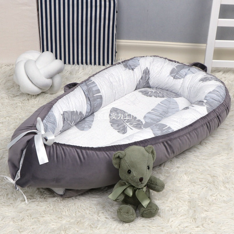 HushPod Luxe Baby Cot: Soft Mattress, Removable Bed & Stylish Ribbon Detail
