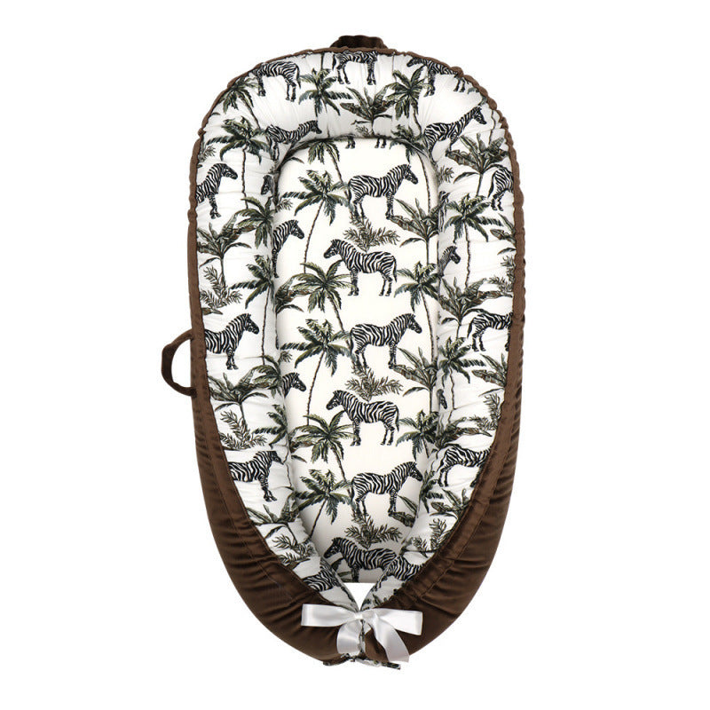 HushPod Luxe Baby Cot: Soft Mattress, Removable Bed & Stylish Ribbon Detail