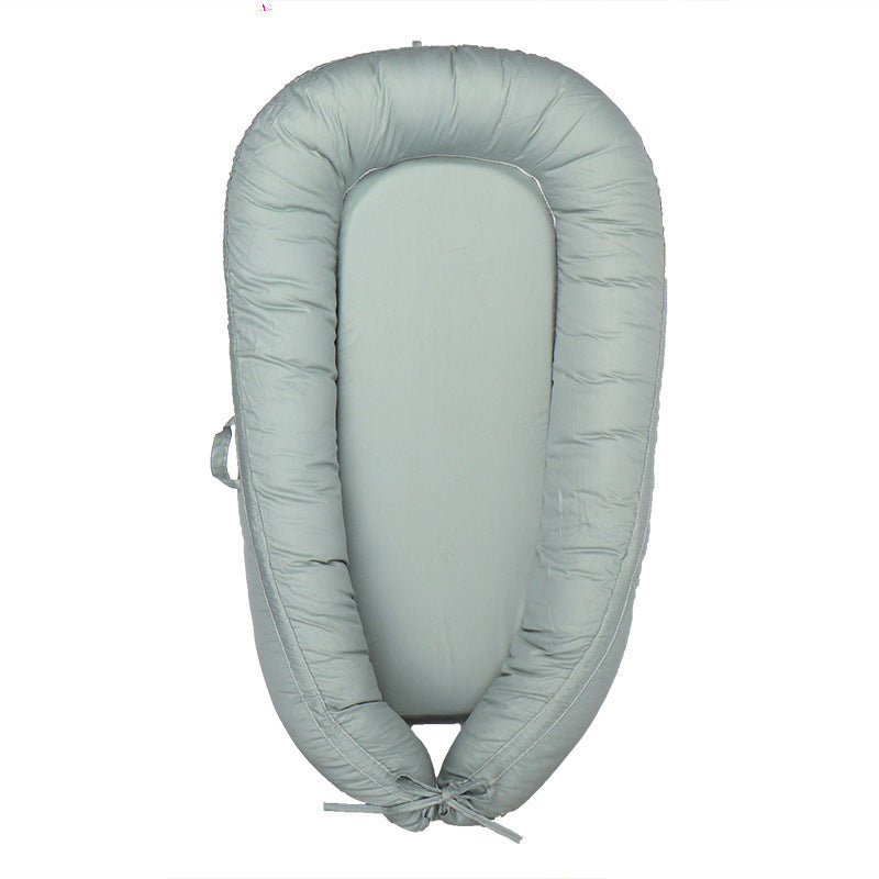 HushPod Luxe Baby Cot: Soft Mattress, Removable Bed & Stylish Ribbon Detail