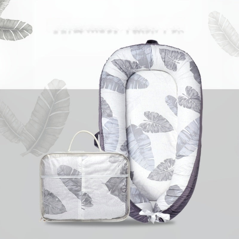 HushPod Luxe Baby Cot: Soft Mattress, Removable Bed & Stylish Ribbon Detail